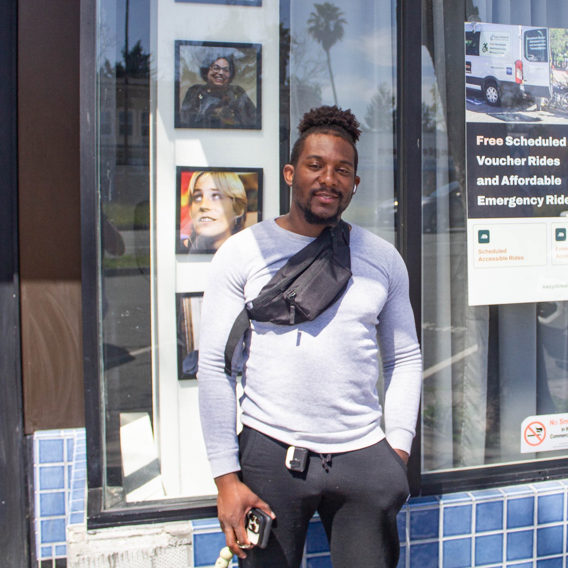 A photo of our newest attendant Charles standing in front of our offices.
